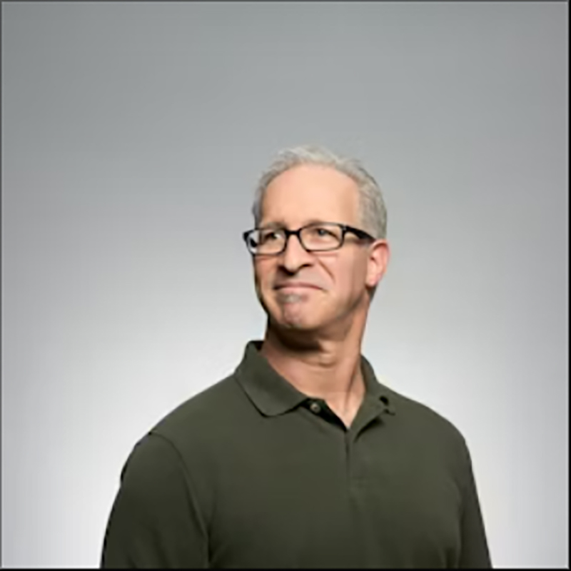 Portrait of Evan Arnold, Chief Technology Officer